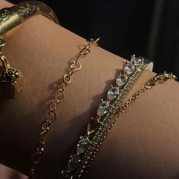 Satellite chain in 14k gold filled, welded on a wrist
