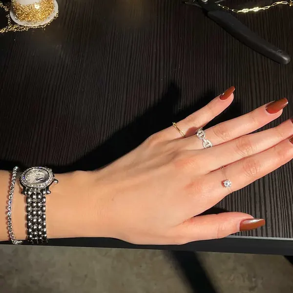 A diamond ring beside a welded chain ring
