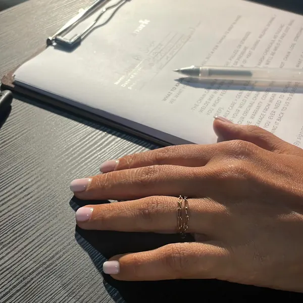 A welded ring on a relaxed hand